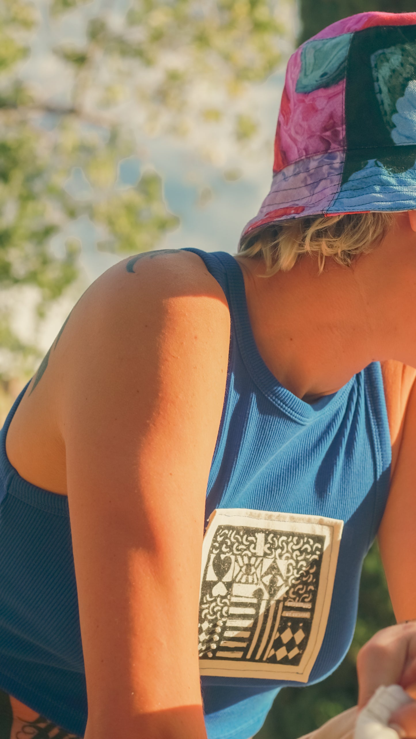 Blue crop tank with patch
